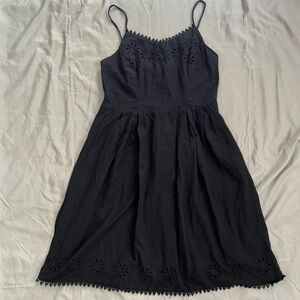 Old Navy black dress with flower cutouts.